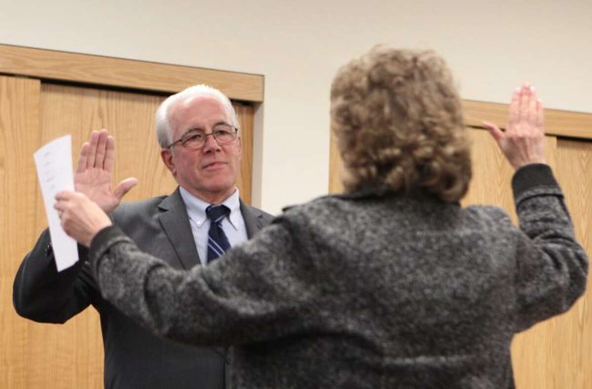 Former Big Rapids Mayor Tom Hogenson spent his career serving the community in many capacities, including on the city commission and as mayor, and took part in many activities promoting public service. Here Hogenson is being sworn in as mayor in 2017.