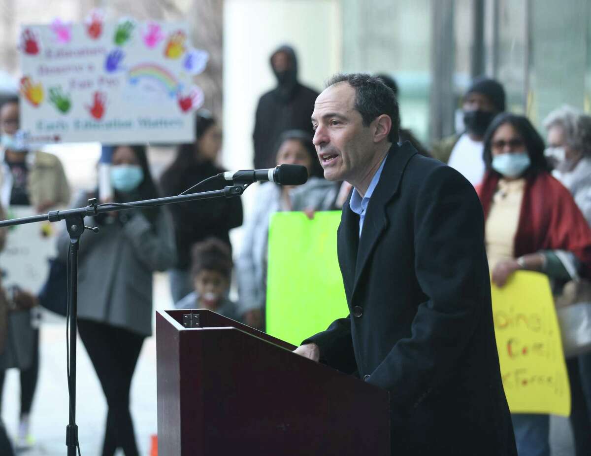 Stamford Board of Finance Chair Richard Freedman speaks during a rally outside the Government Center in Stamford, Conn. Tuesday, March 15, 2022.