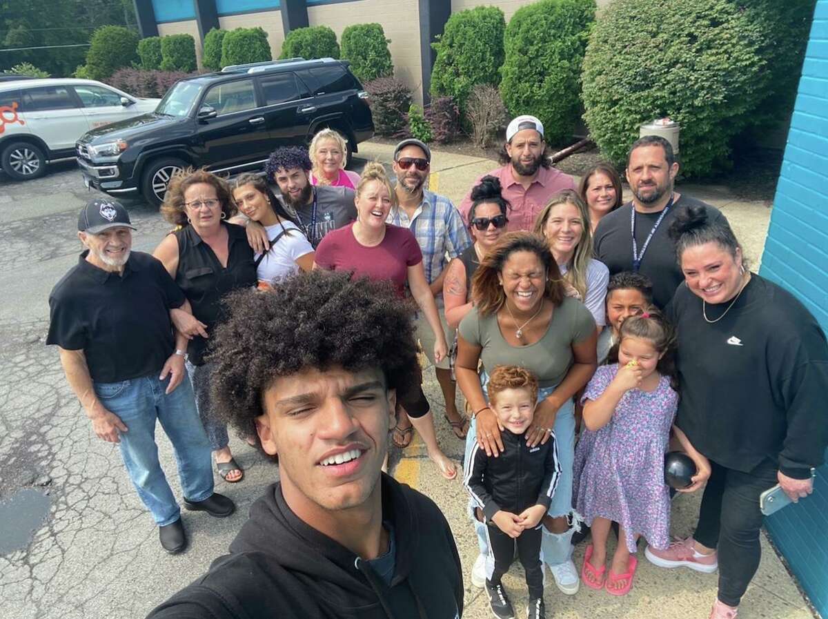 UConn men's basketball sophomore Andre Jackson with family members.