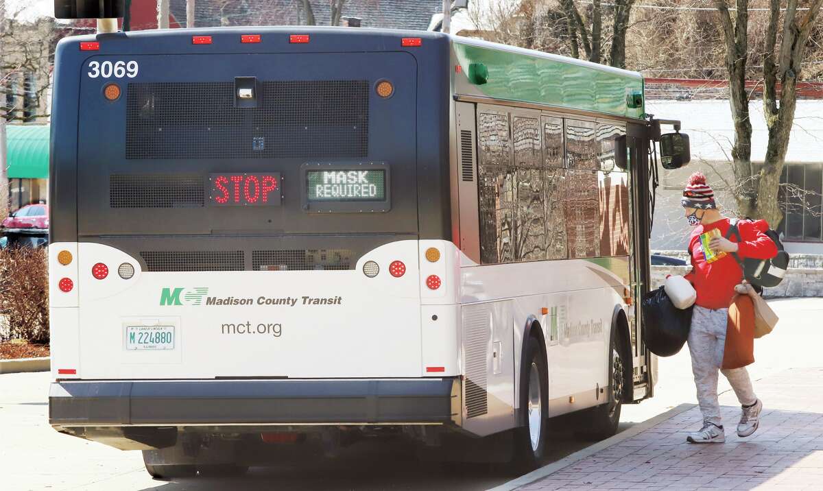 John Badman|The Telegraph An MCT bus stops Tuesday at the downtown Alton bus terminal on Piasa Street. Madison County Transit officials are seeing increased usage of buses and ridesharing as fuel prices climb across the area.