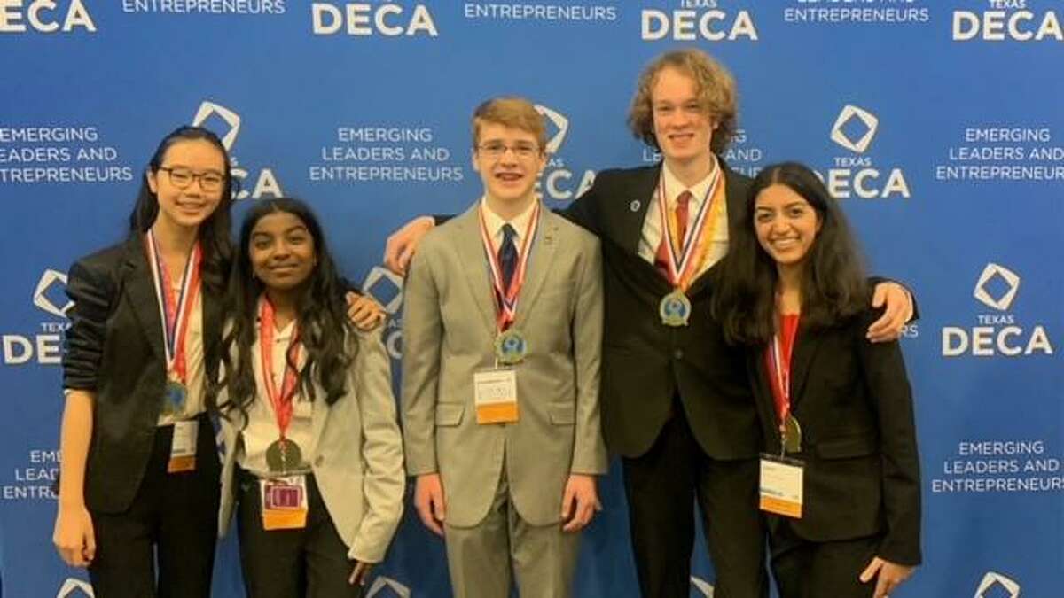 Dawson High School students Irene Shi, left, Meena Muthuraman, Michael Christner, Ryan Hartgerink and Aarushi Lakhi gather at the DECA State Career Development Conference Feb. 24-26 in Houston. The team qualified for the international event April 23-26 in Atlanta.