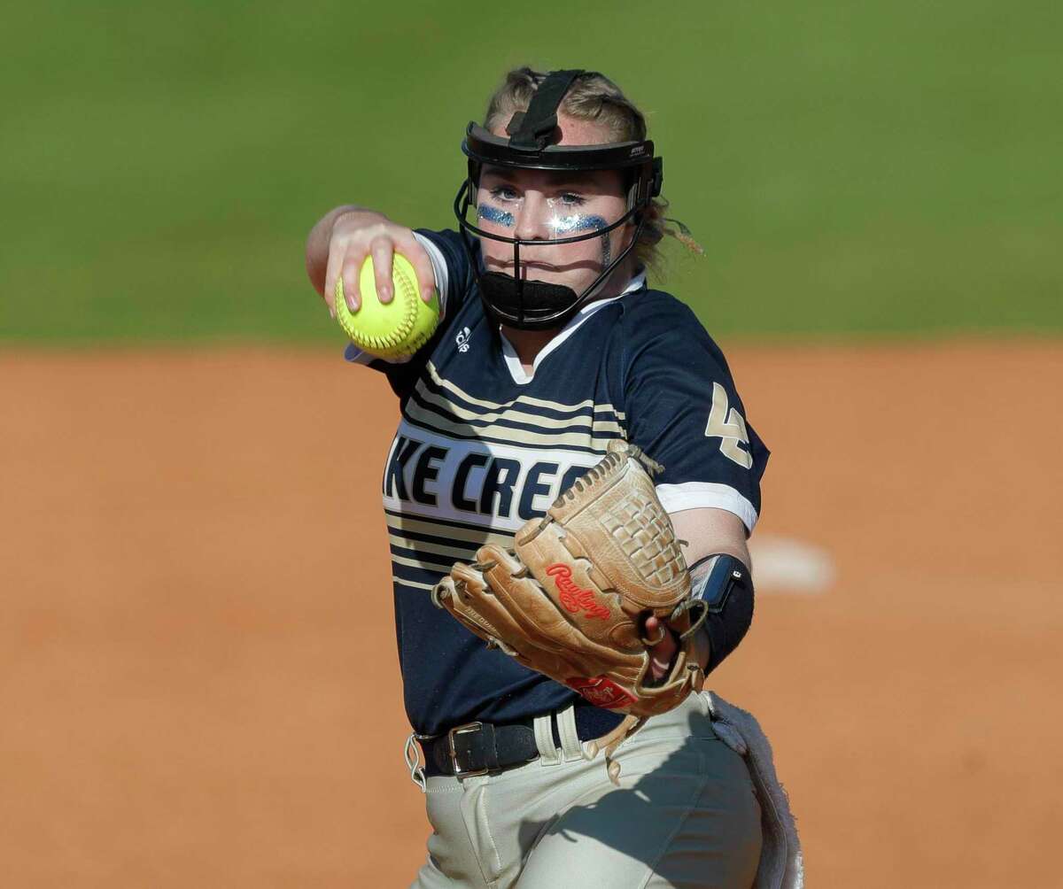 Lake Creek starting pitcher Madison Johnson (19) throws in the first inning of a District 20-5A high school softball game, Tuesday, March 15, 2022, in Montgomery.