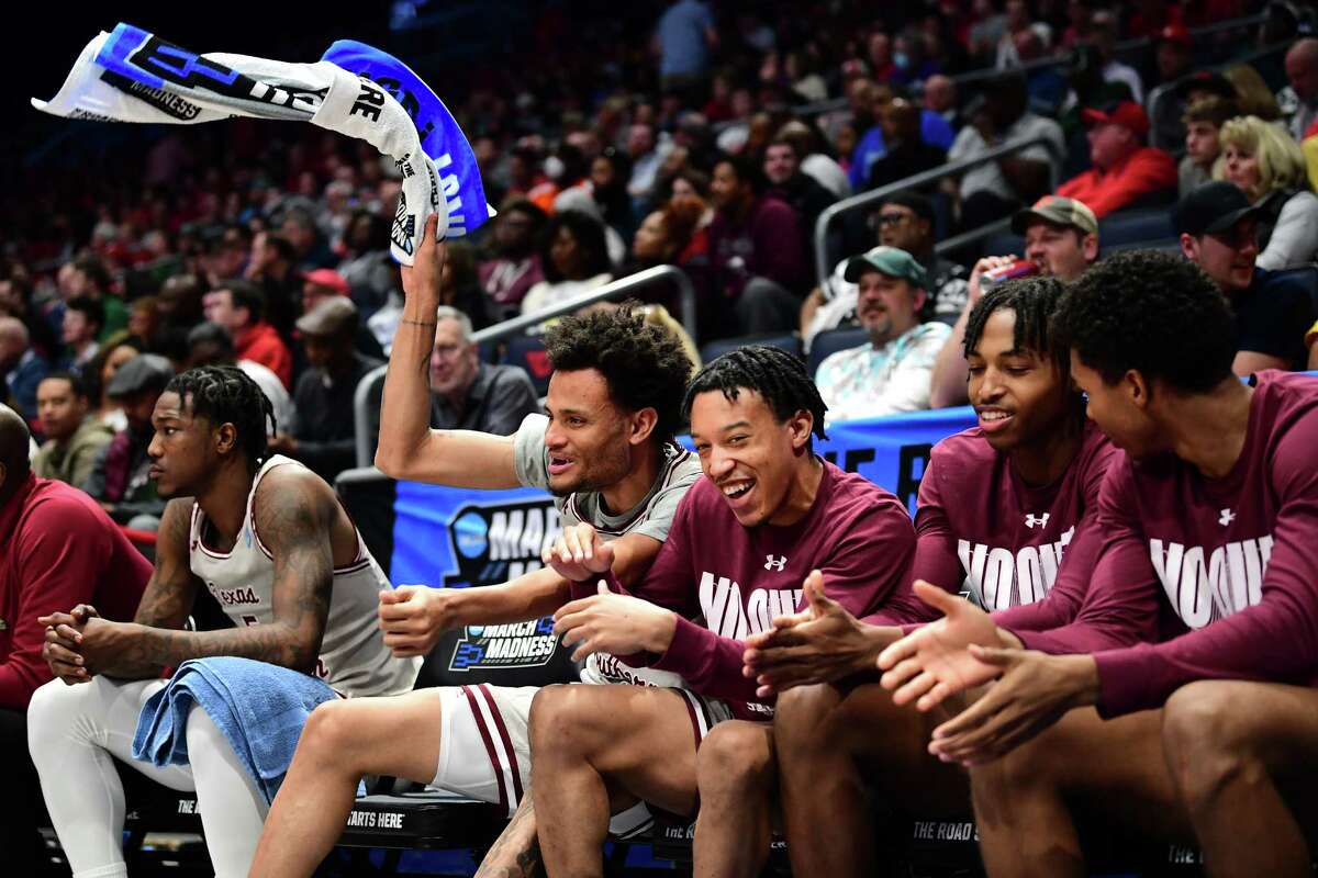 DAYTON, OHIO - MARCH 15: Texas Southern Tigers players react on the bench during the second half against the Texas A&M-CC Islanders in the First Four game of the 2022 NCAA Men's Basketball Tournament at UD Arena on March 15, 2022 in Dayton, Ohio.