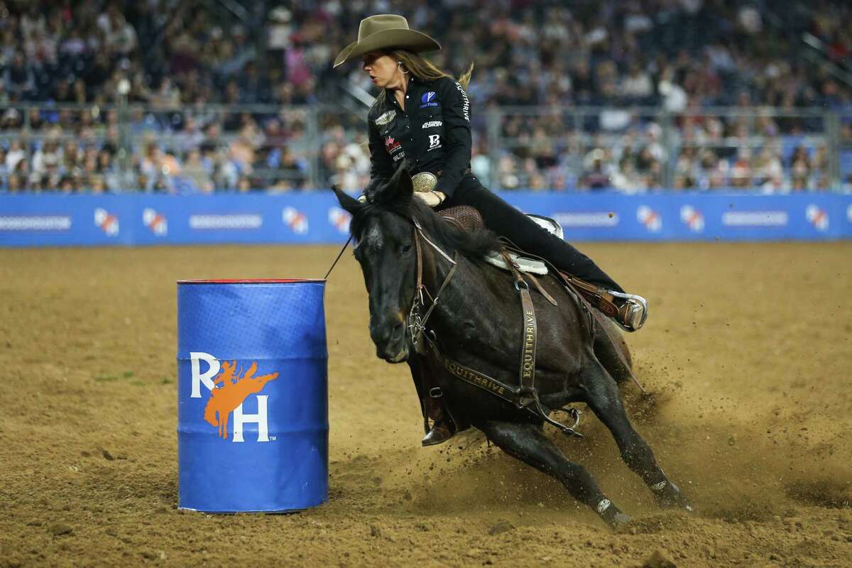 Nellie Miller turns around the first barrel as she rides to a 14.78 in barrel racing during Super Series V, round 3, at RodeoHouston Tuesday, March 15, 2022 in Houston.