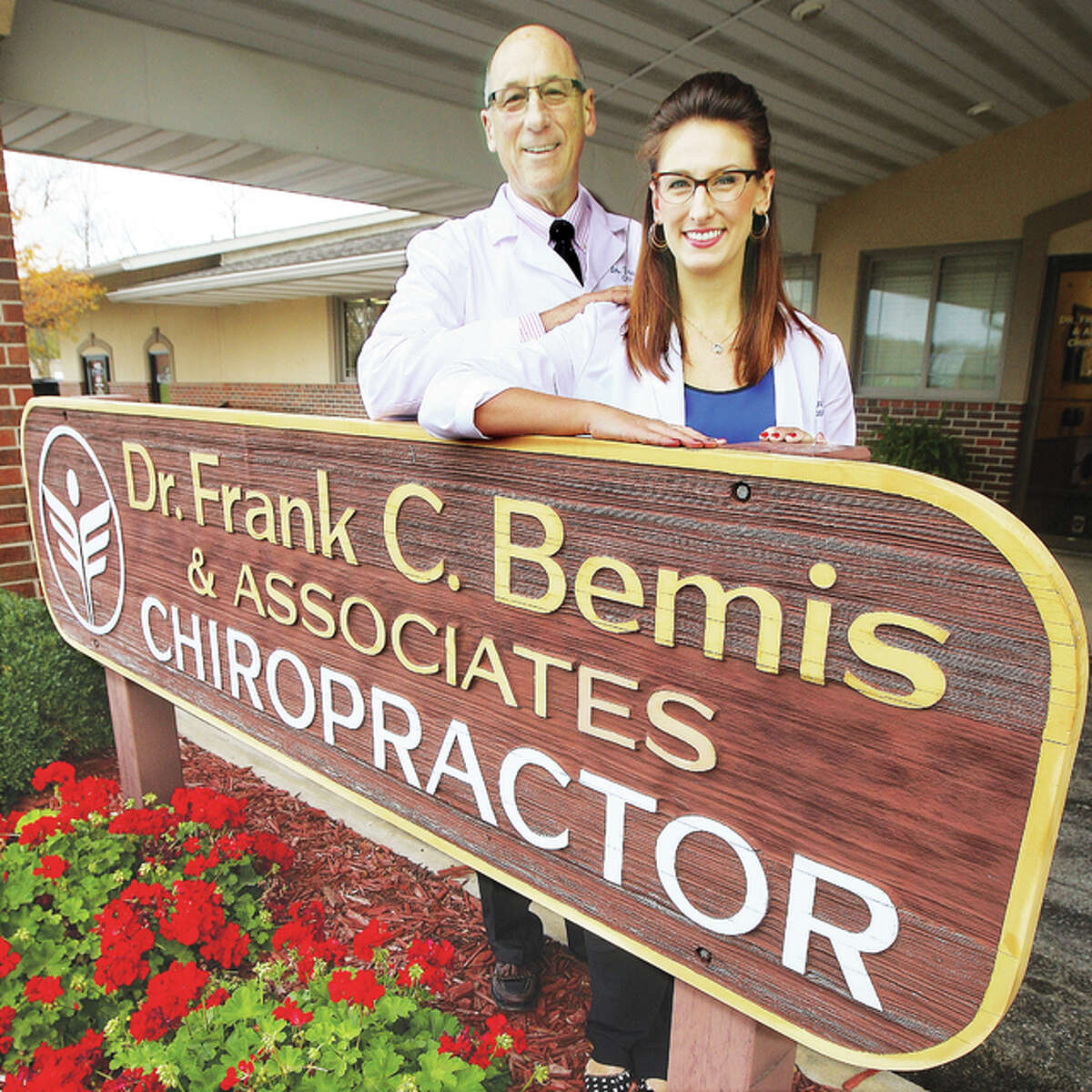 Dr. Frank C. Bemis and his daughter and youngest of three children, Dr. Kristina E. Bemis Tupman, stand outside their offices in 2015 when Bemis Tupman joined his practice. The practice shortly thereafter became Bemis Tupman Chiropractic as her husband, Dr. Stephen P. Tupman, and she purchased her father's practice in 2019.