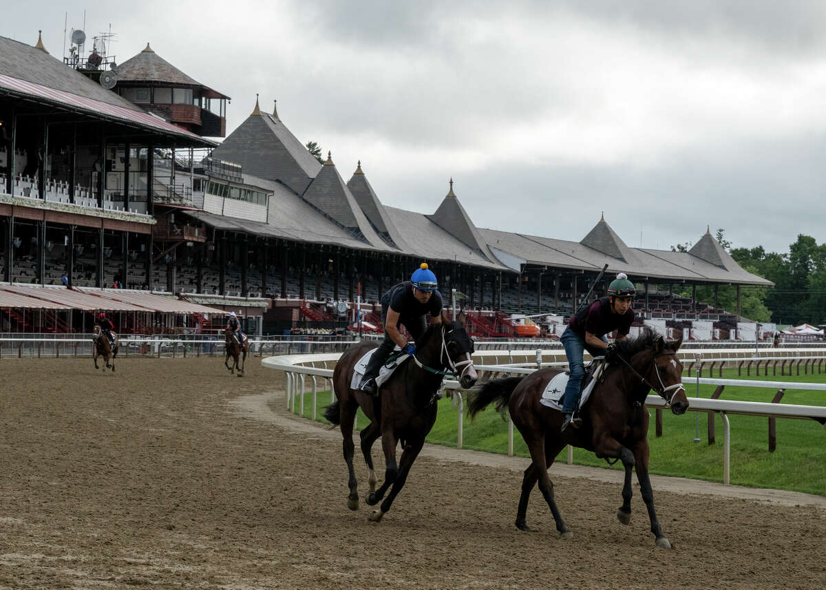 Horses train on the main track at the Saratoga Race Course on Wednesday July 14, 2021 in Saratoga Springs, N.Y. Saratoga Race Course is one of three tracks operated by the New York Racing Association (NYRA). The state comptroller raised concerns about some of NYRA's spending in a new audit. Photo Special to the Times Union by Skip Dickstein