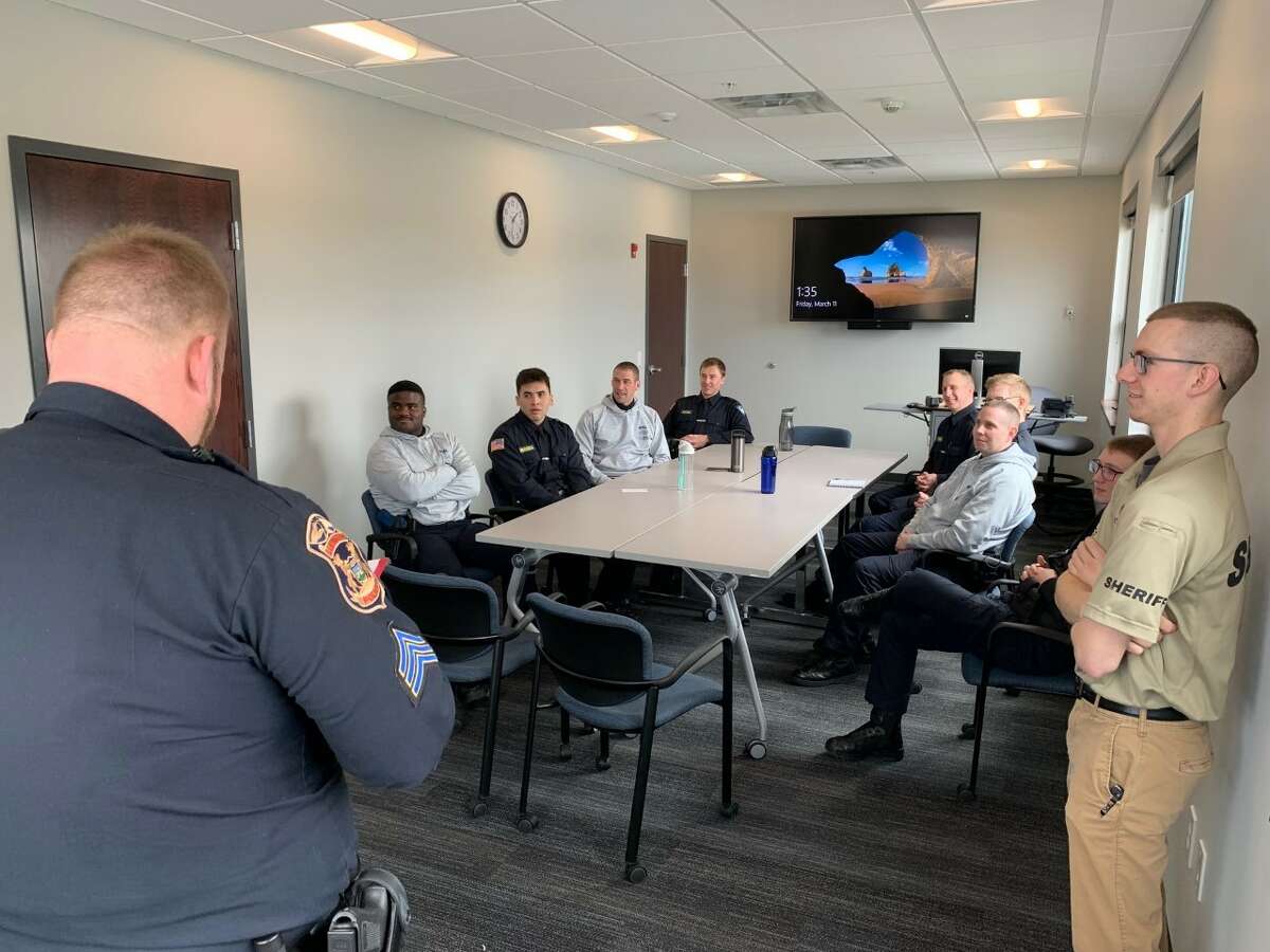 Male recruits discussed a list of items that often come up with new officers when they start their careers, including a field training program and navigating professional opportunities, during a West Shore Community College Police Academy seminar on March 11.