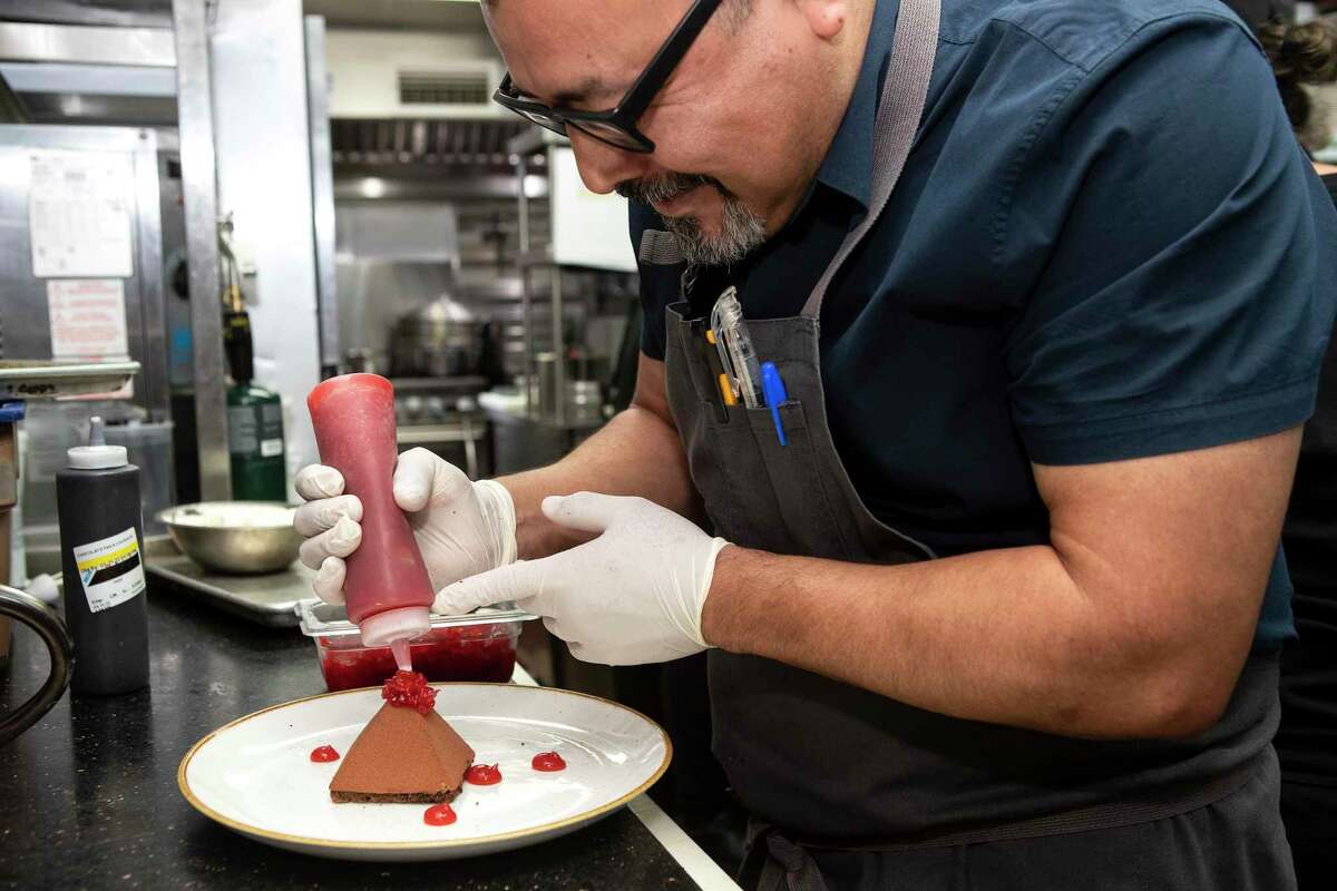 Pastry chef Ruben Ortega makes a chocolate pyramid as he works in the kitchen at Hugo’s Wednesday, only hours after he was named a finalist for Outstanding Pastry Chef for the 2022 James Beard Awards for his work at Xochi. Ortega oversees pastry operations at the H-Town Restaurant Group restaurants from Hugo Ortega and Tracy Vaught.