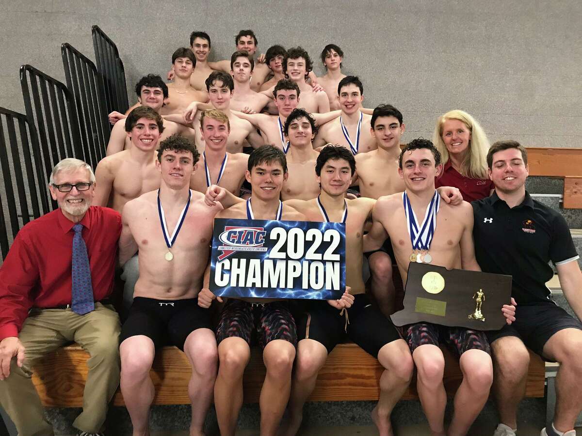 Greenwich celebrates after winning the CIAC Class LL boys swimming and diving championship on Wednesday in West Hartford.