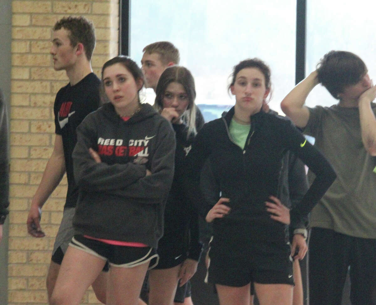 Reed City track members get ready for a workout on Tuesday.