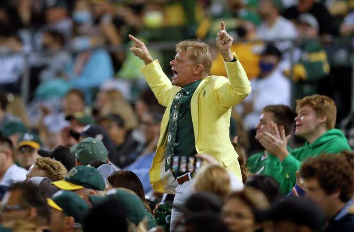 An Oakland Athletics' fan tries to fire up the team in 8th inning against New York Yankees during MLB game at Oakland Coliseum in Oakland, Calif., on Thursday, August 26, 2021.