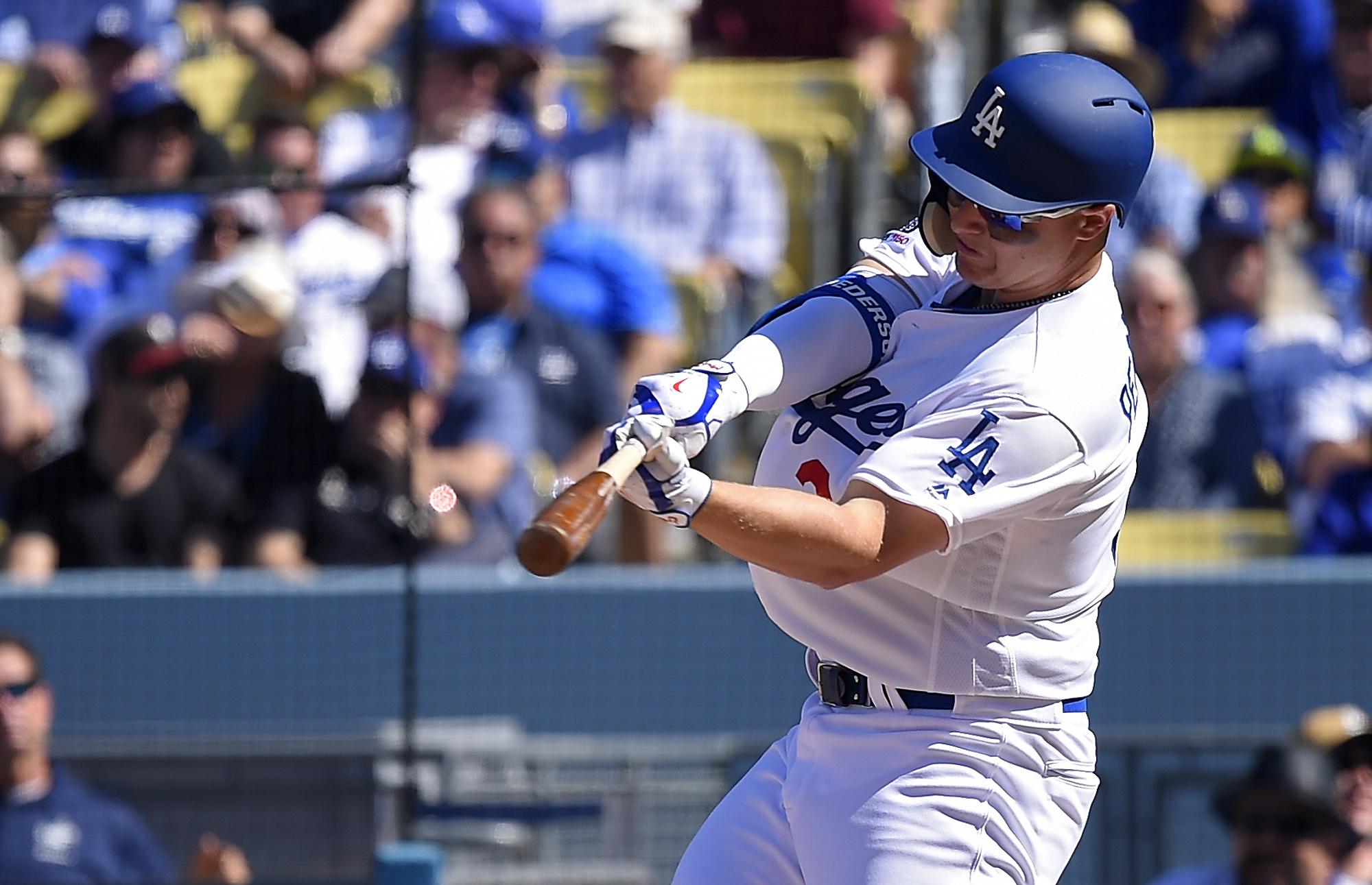 Joc Pederson of the Los Angeles Dodgers warms up before the game