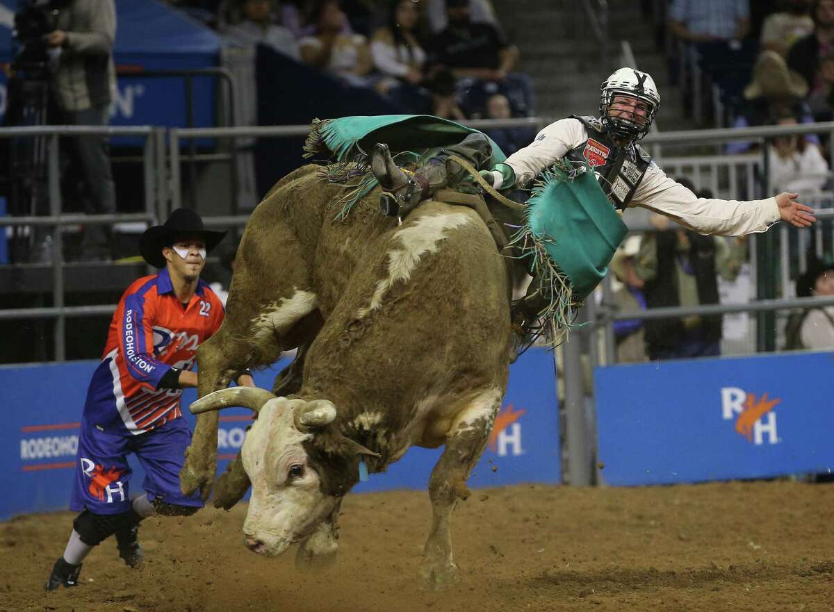 Garrett Smith is bucked off in bull riding during Super Series Semifinal 1 at Houston Livestock Show and Rodeo Wednesday, March 16, 2022, at NRG Stadium in Houston.