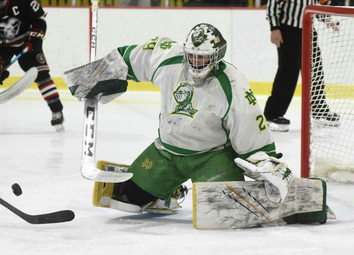 Notre Dame-WH goalie Peter Alfano makes a save during the CIAC Division I boys hockey semifinals.