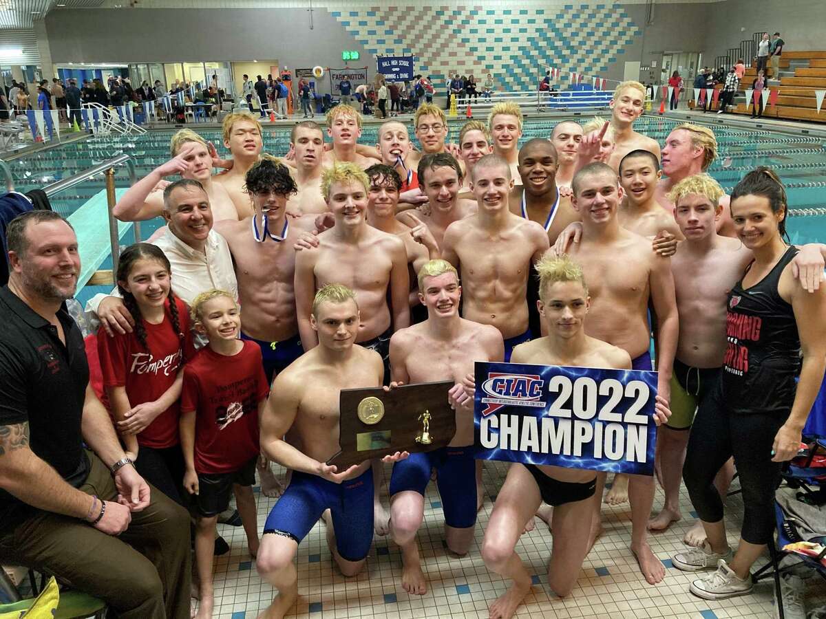 Pomperaug celebrates after winning the CIAC Class M boys swimming and diving championship on Wednesday, March 16, 2022 at Cornerstone Pool in West Hartford, Conn.