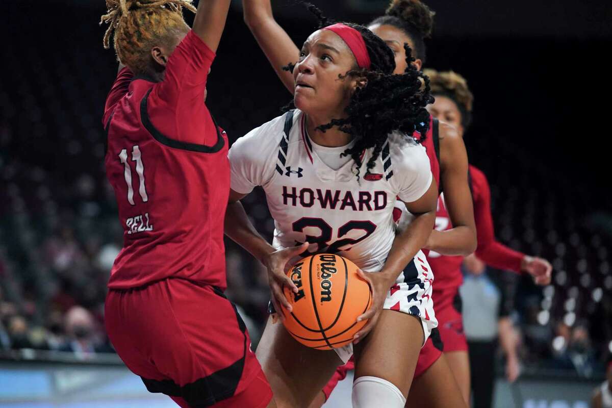 Howard forward Krislyn Marsh (32) drives against Incarnate Word guard Myra Bell (11) during the first half of a First Four game in the NCAA women's college basketball tournament Wednesday, March 16, 2022, in Columbia, S.C. (AP Photo/Sean Rayford)