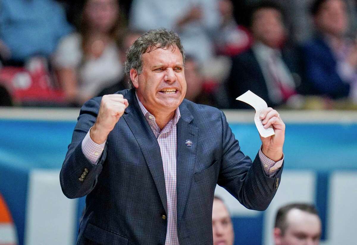 Longwood head coach Griff Aldrich gives instructions to his team during an NCAA college basketball game against Winthrop for the championship of the Big South Conference men's tournament on Sunday, March 6, 2022, in Charlotte, N.C. (AP Photo/Rusty Jones)