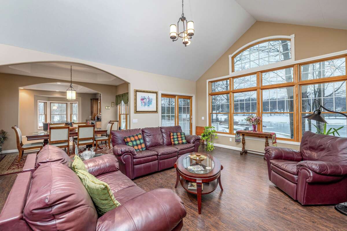 This Canadian Lakes home is listed at $500,000 and is just feet from the water and features a finished basement and open floor plan. 