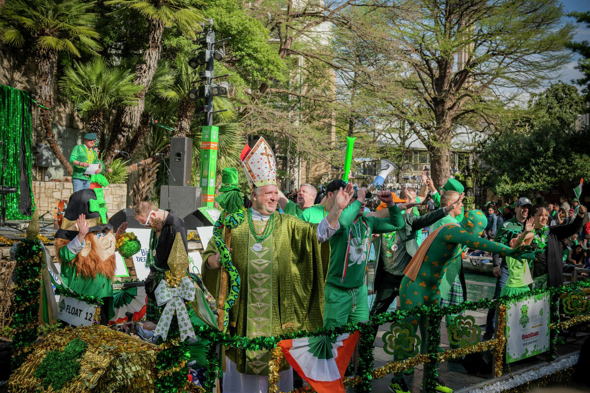 A man dressed as St. Arnold waves to crowds at the Arneson River Theater during the St. Patrick's Day River Parade on Sunday, March 17, 2019. Only about 4.7 percent of Bexar County residents claim Irish ancestry, according to the U.S. Census. 