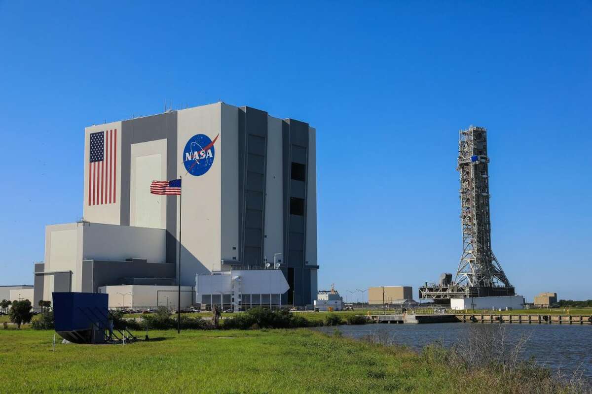 The mobile launcher for the Artemis I mission, atop crawler-transporter 2, arrives at the Vehicle Assembly Building (VAB) at NASA’s Kennedy Space Center in Florida on Oct. 30, 2020. The agency will roll the combined Space Launch System (SLS) rocket and Orion spacecraft out of the VAB atop crawler-transporter 2 to Launch Pad 39B at the NASA’s Kennedy Space Center in Florida for testing no earlier than March 2022.