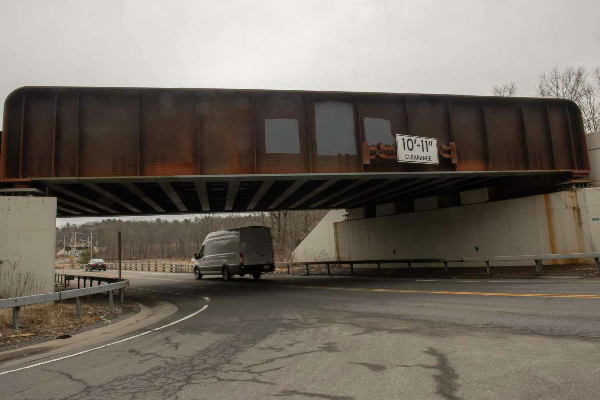 Report: Truck trailer top sheared off at Glenville overpass