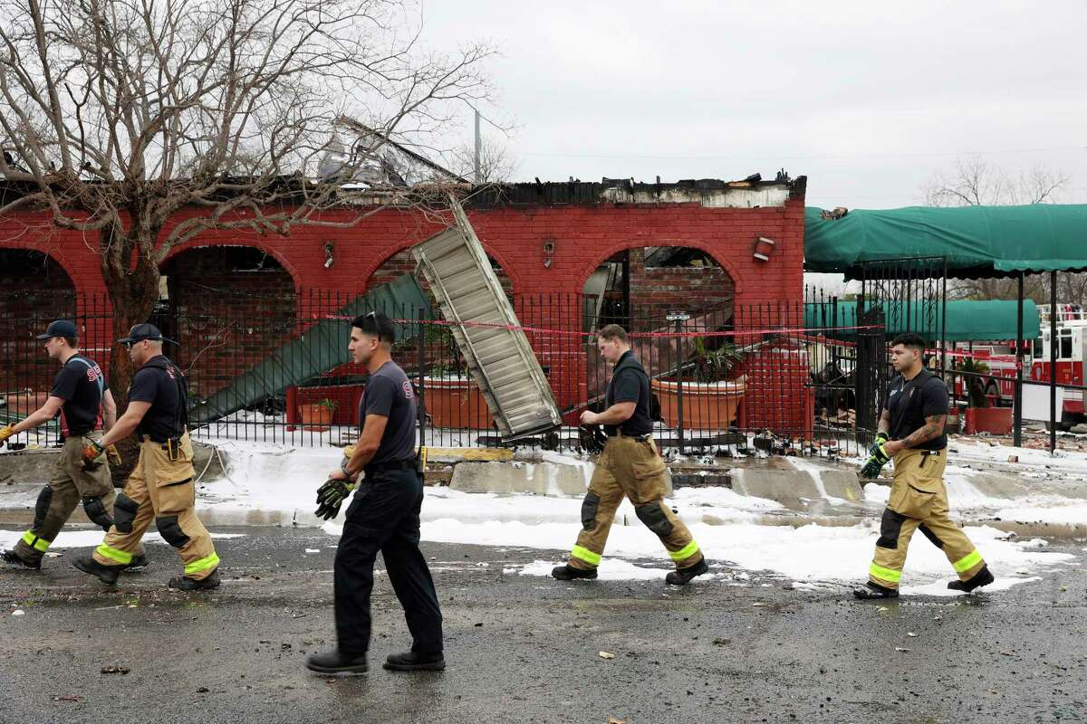 San Antonio emergency personnel wrap up at a fire that destroyed the beloved Jacala Restaurant on 600 West Avenue, Thursday, March 17, 2022. The fire was reported at around 6:30 a.m. with 20 units from the San Antonio Fire Department responding. The restaurant that has been opened since 1949 was declared a total loss.