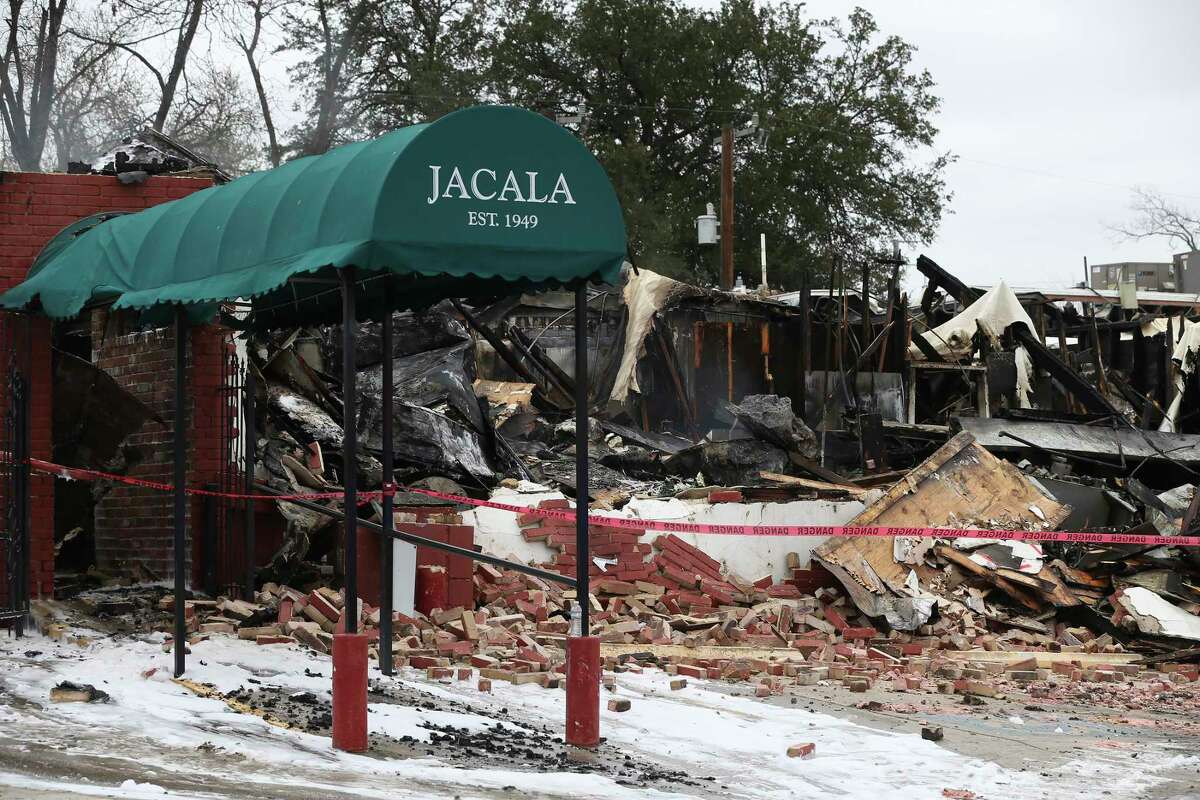 San Antonio emergency personnel wrap up at a fire that destroyed the beloved Jacala Restaurant on 600 West Avenue, Thursday, March 17, 2022. The fire was reported at around 6:30 a.m. with 20 units from the San Antonio Fire Department responding. The restaurant that has been opened since 1949 was declared a total loss.