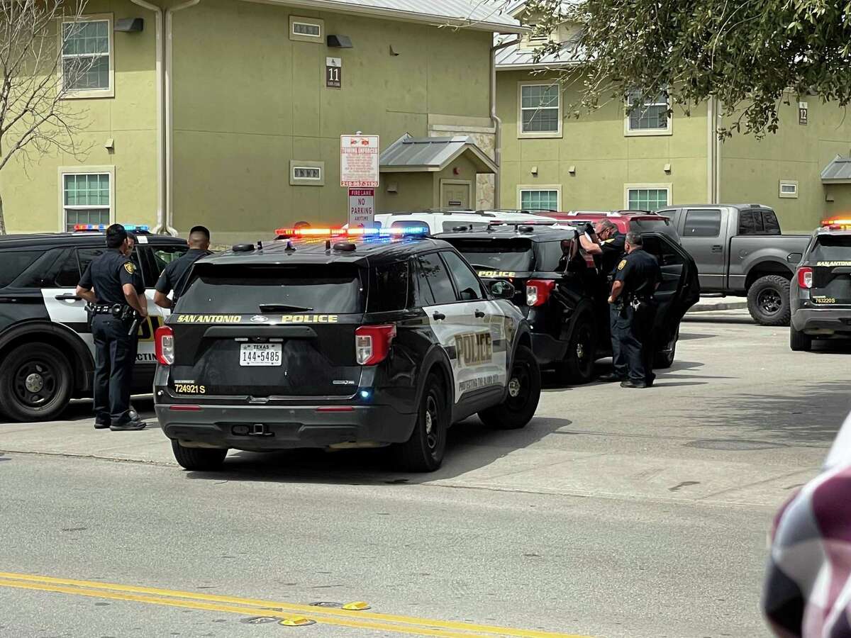 San Antonio police investigate an early afternoon shooting that left a 14-year-old boy wounded in the 700 block of West Mayfield Boulevard on Thursday, March 17, 2022.