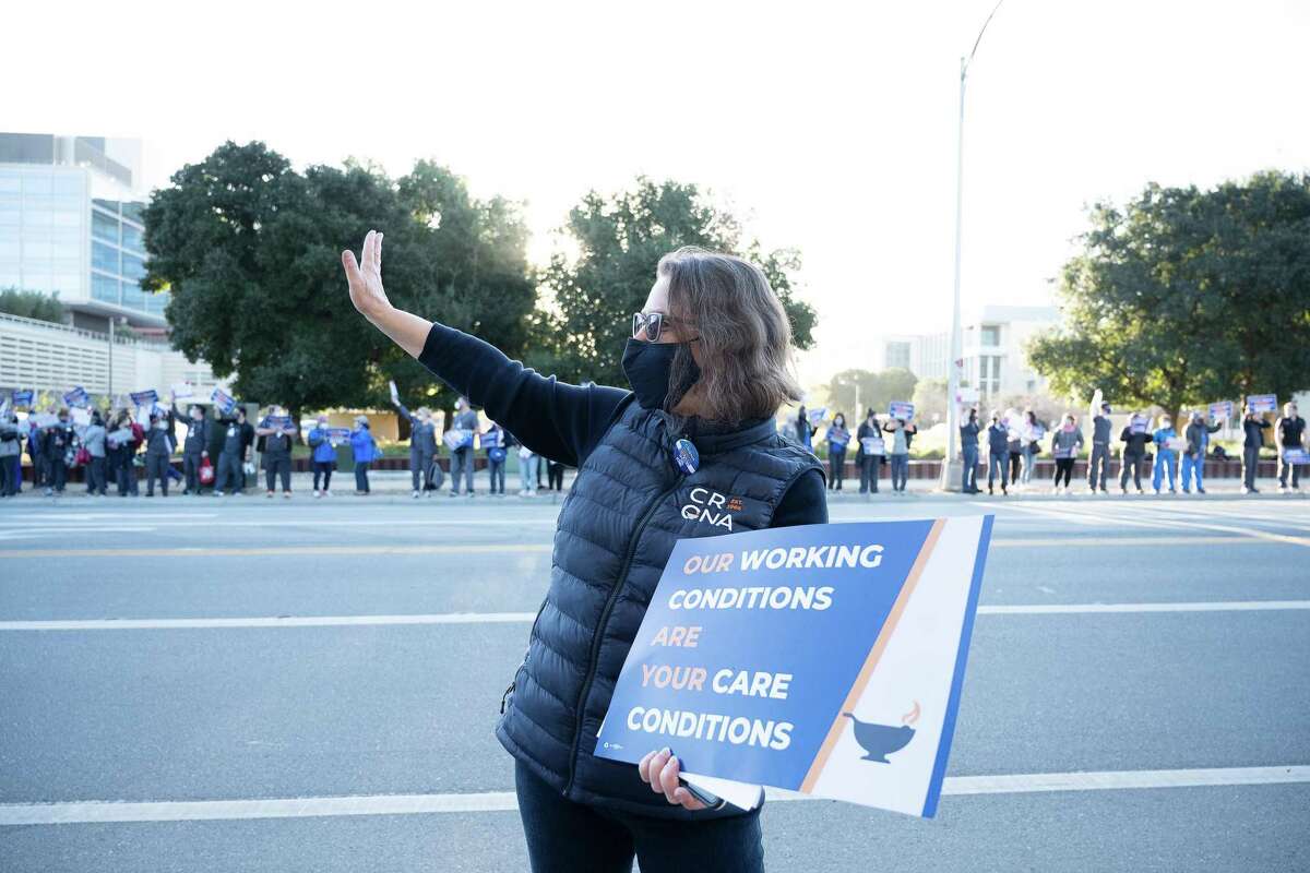Nancy Uschersohn, a nurse at Lucile Packard Children’s Hospital, rallies outside Stanford Hospital in Palo Alto on March 9. Nurses are in labor negotiations with Packard and Stanford Health.