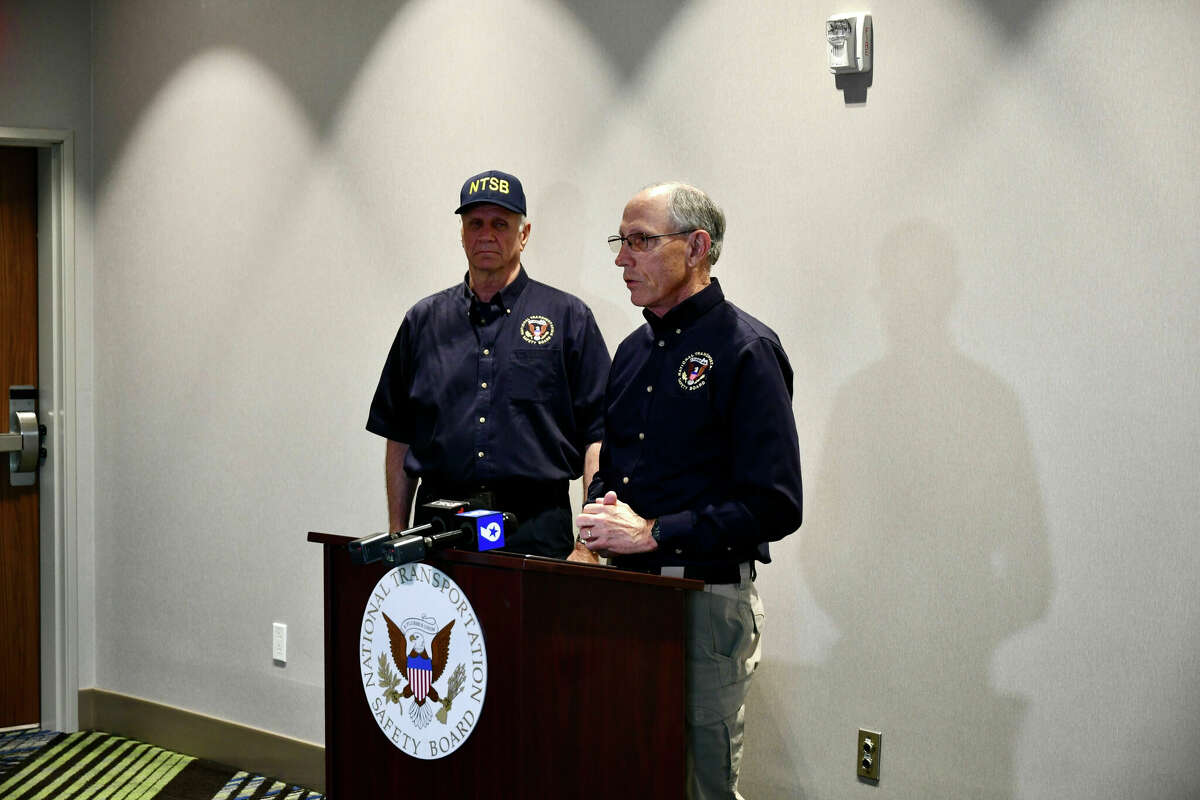 National Transportation Safety Board Vice Chairman Bruce Landsberg, right, and Investigator Robert Acetta answer questions from the media Thursday, March 17, 2022, in Odessa, Texas. NTSB is investigating the March 15, 2022, fatal crash that killed nine people in Andrews, Texas.