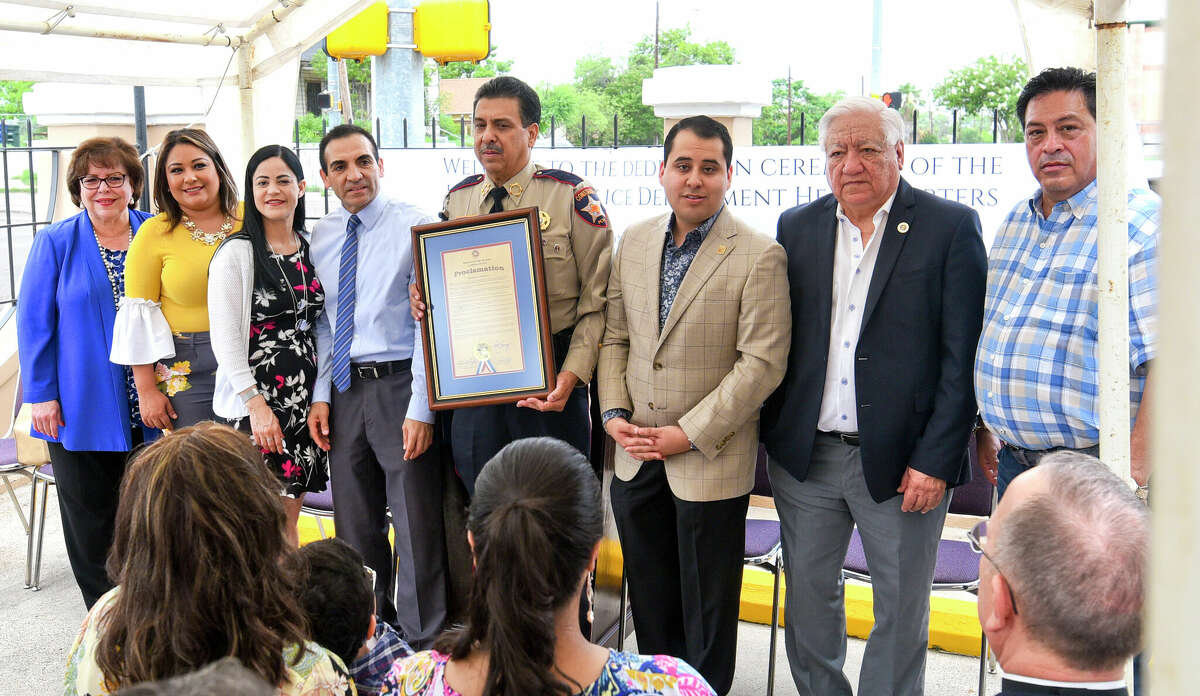 City officials and LISD Board members gather to recognize Constable Rodolfo "Rudy" Rodriguez by dedicating the LISD Police Department Headquarters in his name Friday, May 17, 2019, at the Rodolfo "Rudy" Rodriguez Police Department.