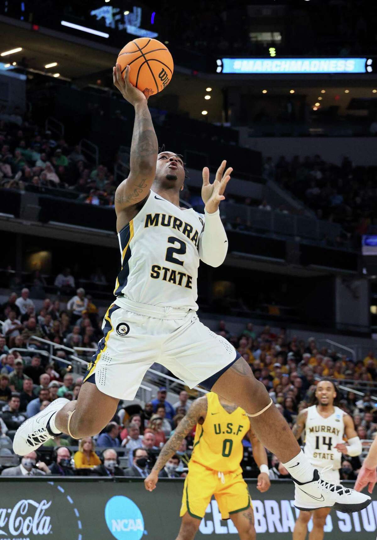 INDIANAPOLIS, INDIANA - MARCH 17: Trae Hannibal #2 of the Murray State Racers shoots the ball against the San Francisco Dons during the first half in the first round game of the 2022 NCAA Men's Basketball Tournament at Gainbridge Fieldhouse on March 17, 2022 in Indianapolis, Indiana. (Photo by Andy Lyons/Getty Images)
