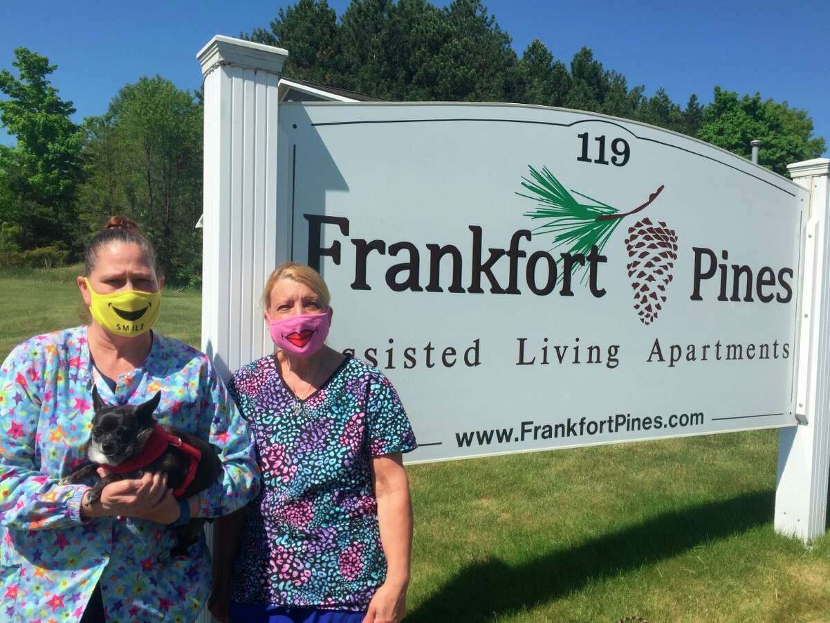 Sheryl Zilch (with Toby) and Deb Harrison, who both worked at Frankfort Pines Assisted Living in 2021 during the COVID-19 pandemic, stayed in the facility for three months to ensure they didn't contract COVID-19 outside of the workplace. 