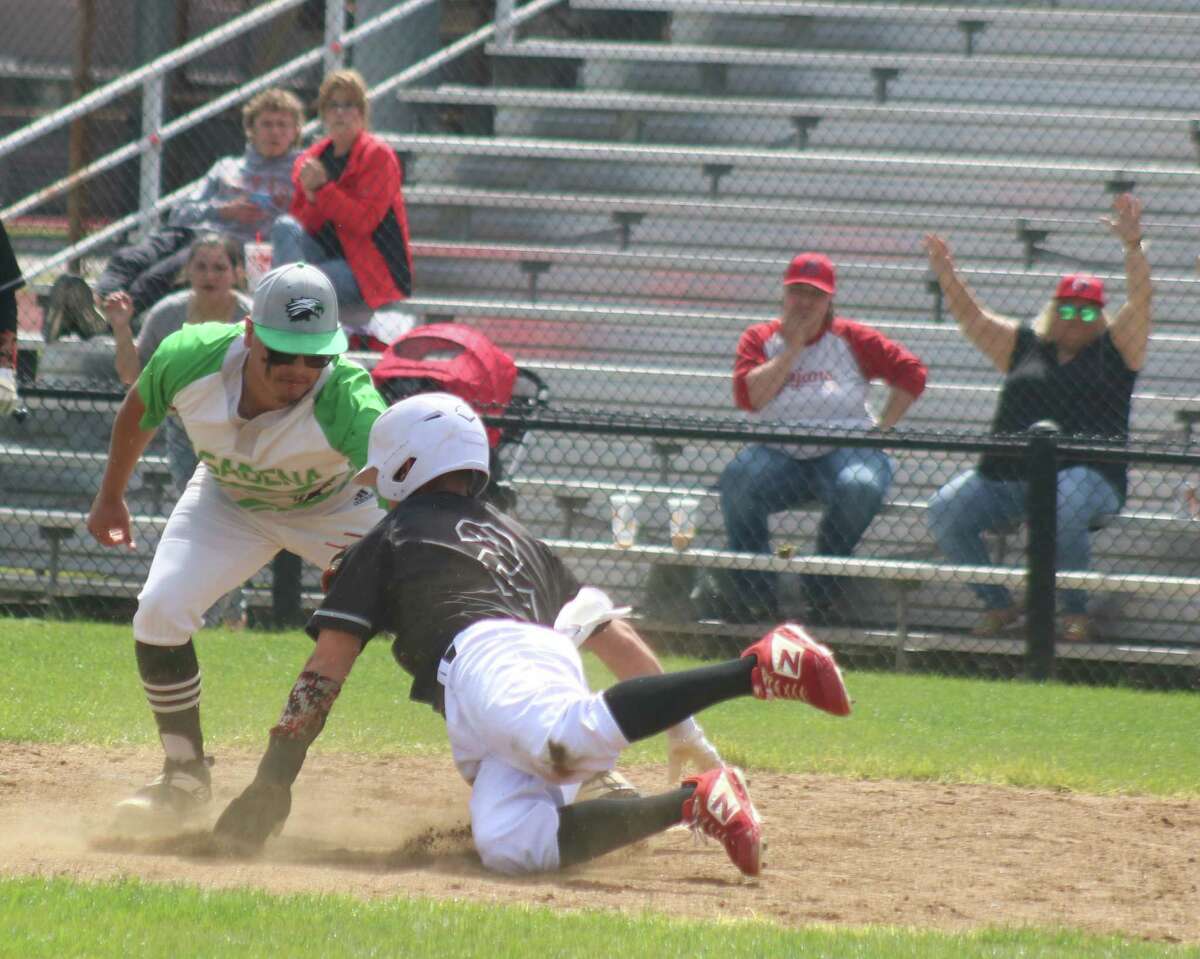 South Houston's Richard Gallegos gets tagged out at the plate in fourth-inning action Thursday afternoon. Gallegos was attempting to score a fourth run that would have upped the lead to 7-4.