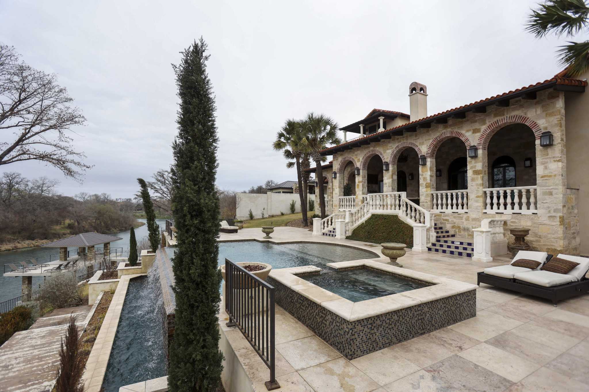 Lavish New Braunfels pool and spa on terraced backyard bring