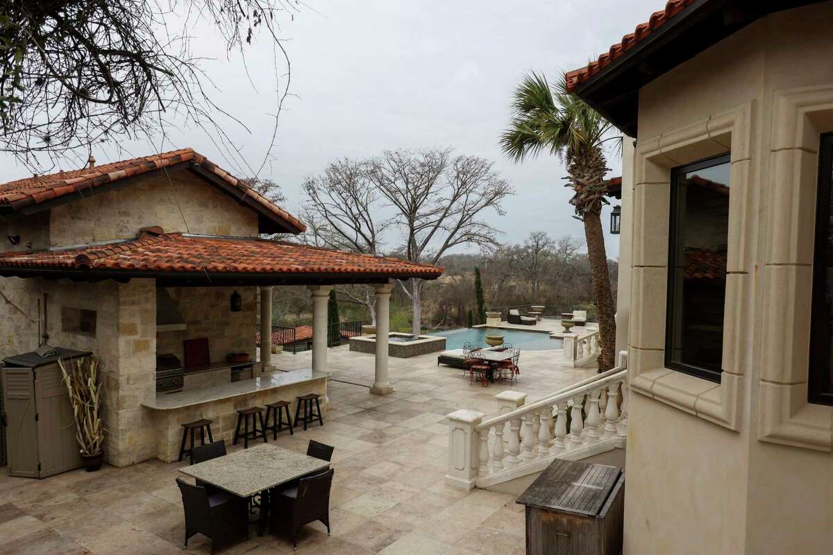 Lavish New Braunfels pool and spa on terraced backyard bring