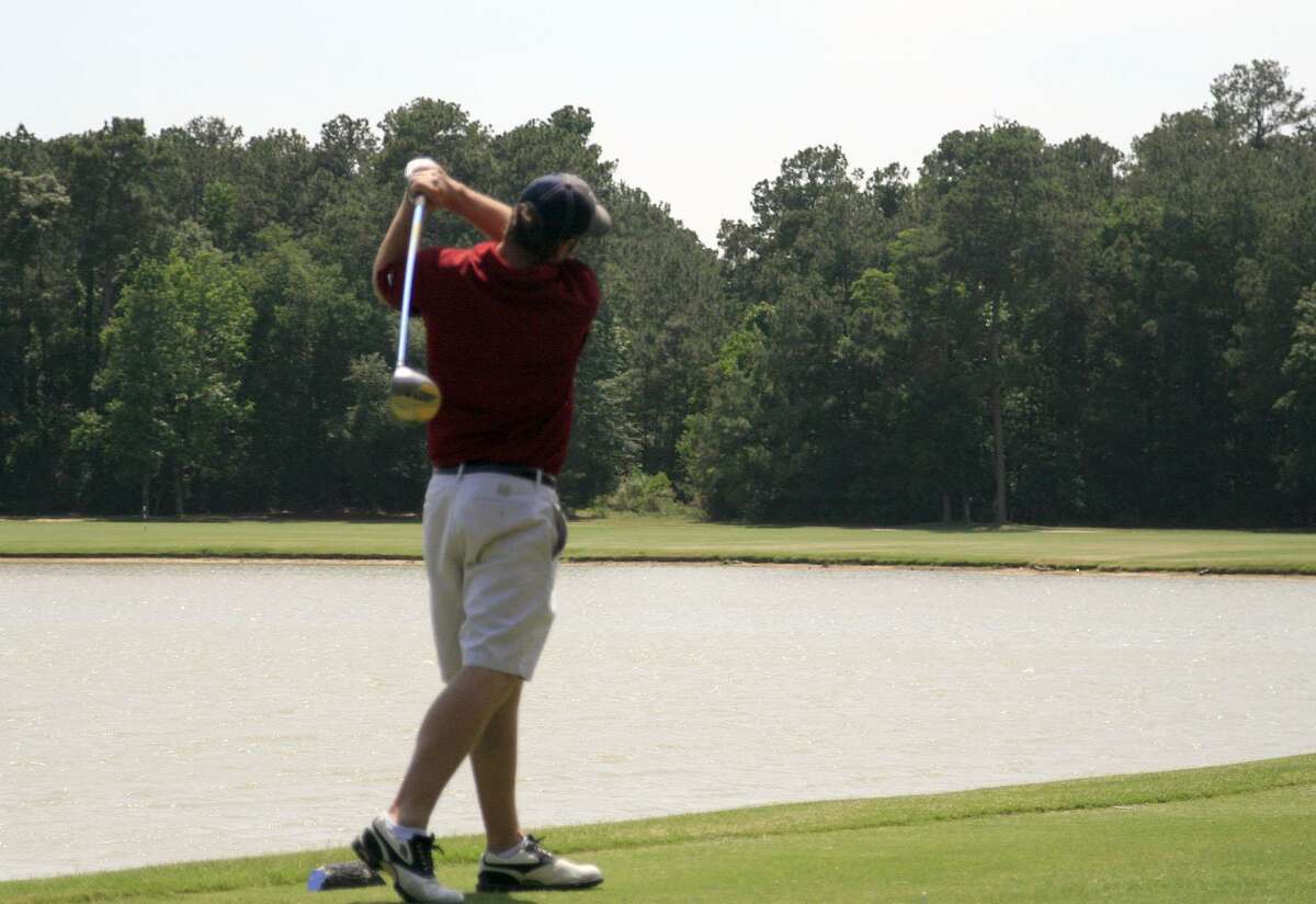A golfer takes a swing at the ball as a participant in the 10th annual Village Learning and Achievement Center's golf tournament at Tour 18. The Village Centers invites golfers and non-golfers alike to participate in their 22nd Annual Charity Golf Tournament, on Friday, March 25, at The Clubs of Kingwood, 1700 Lake Kingwood Trail in Kingwood. Proceeds from the event will benefit The Village Centers as they continue to provide specialized programs and services for adults with intellectual and developmental disabilities and their families. Registration and lunch will begin at 11 a.m. with a shotgun start to follow at 1 p.m. on the Lake Course. During the tournament, guests will enjoy exciting contests, beverage service, a silent auction, and meals served on two holes. The day concludes with an awards ceremony at 5 p.m. For sponsorships, golf ball drop purchases, mobile bidding registration, and more, visit www.betterunite.com/village-golf2022 or contact the Development Team at development@villagelac.org.