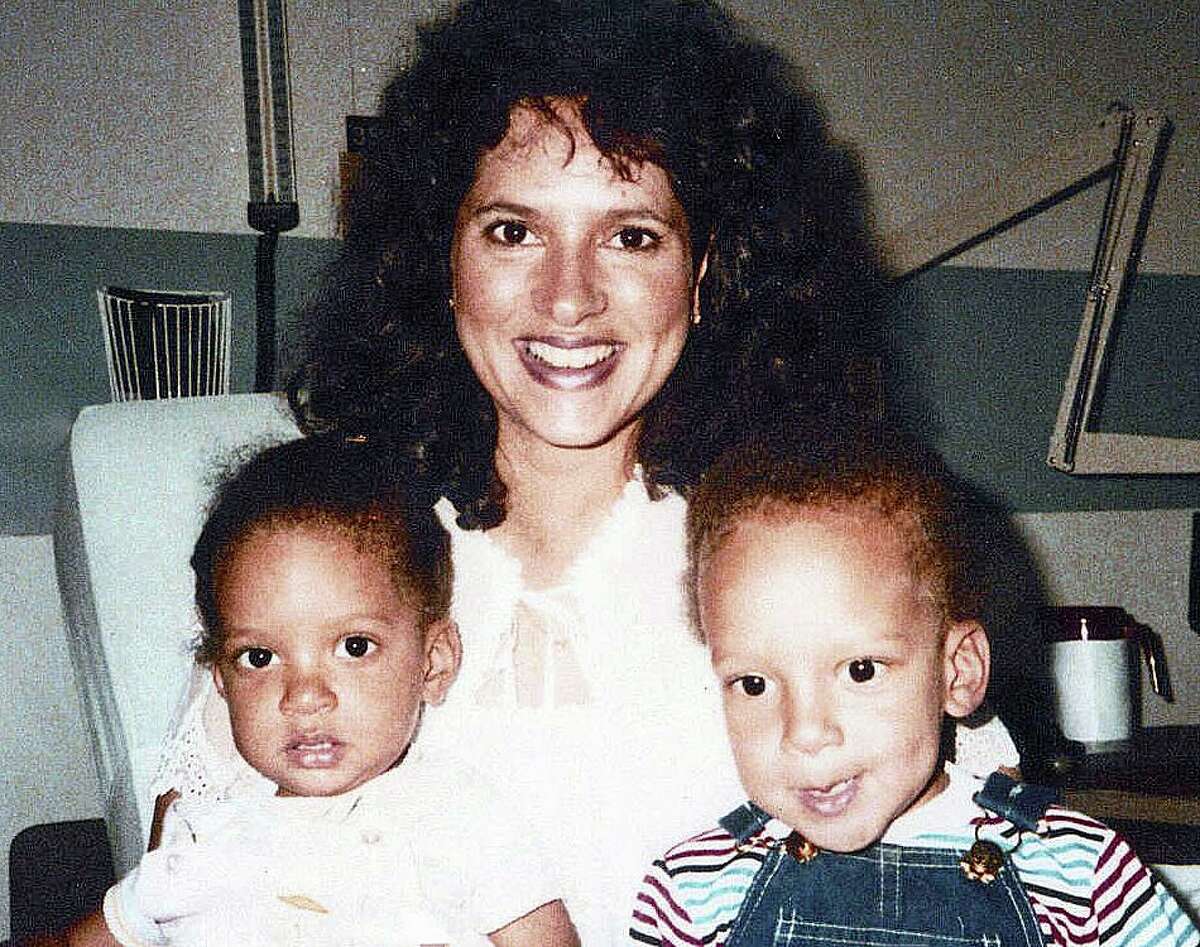 Regina Brown, a Newtown woman who disappeared in 1987, with two of her children Reina and Nicholas.
