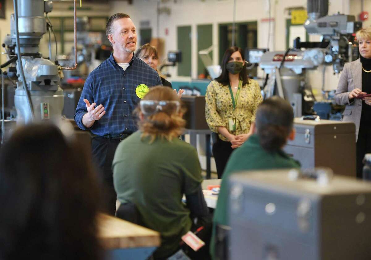 Forum Plastics President Mark Polinsky speaks with students following the Waterbury company's surprise donation of twenty-two individual sets of machinist tools to students in the precision machining program at Emmett O'Brien Technical High School in Ansonia, Conn., on Friday, March 18, 2022.