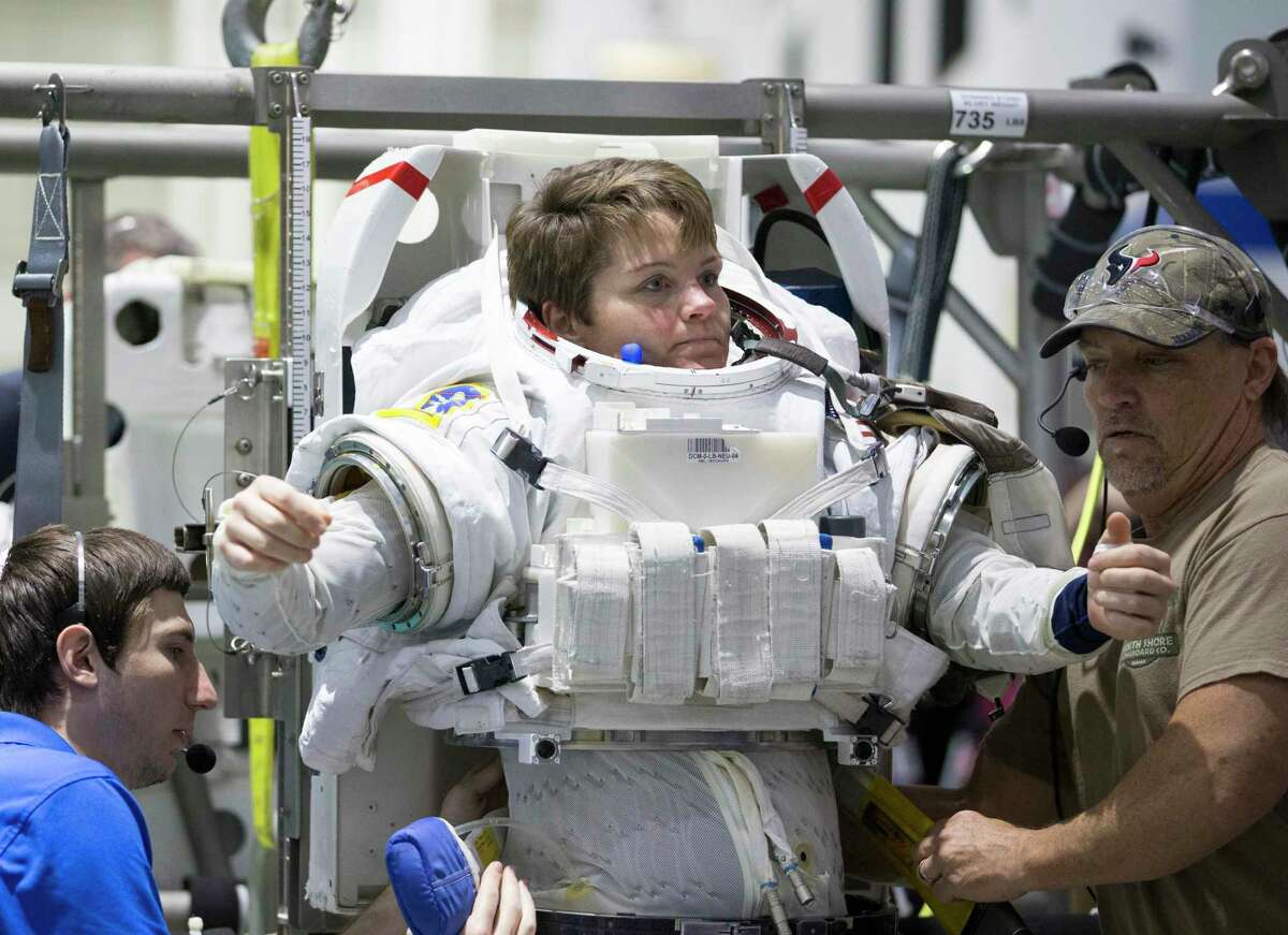 An operator prepares his Self-Contained Atmospheric Protective Ensemble  suits at the suit-up room at the Multi-Payload Processing Facility at  NASA's Kennedy Space Center October 31, 2018 in Cape Canaveral, Florida  Stock Photo 