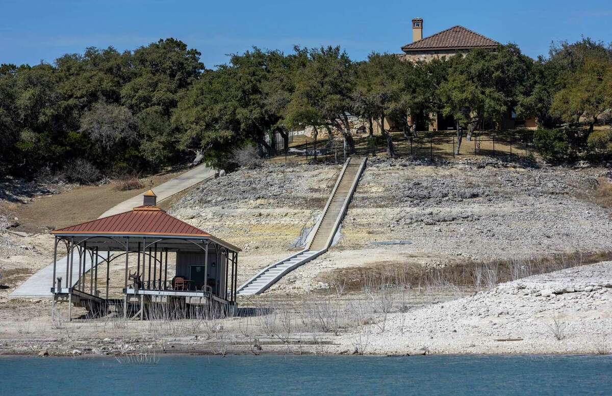 A boat dock sits high and dry on Medina Lake on March 2, 2022, as the lake is at 24.5 percent full.
