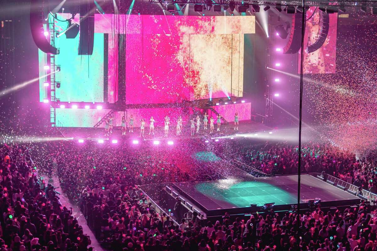 K-pop group Twice performs during its Bay Area debut concert at the Oakland Arena in February. The state is changing the COVID rules to enter such indoor “mega events.”