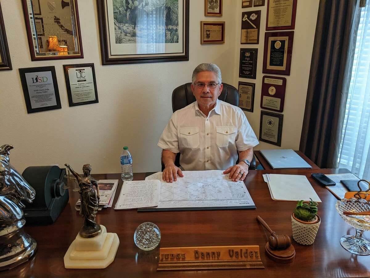 Former Webb County Judge Danny Valdez, who served from 2007 to 2014, sits in his home office as he discussed the new international bridge beign proposed. Photo taken on Mar. 18, 2022. 