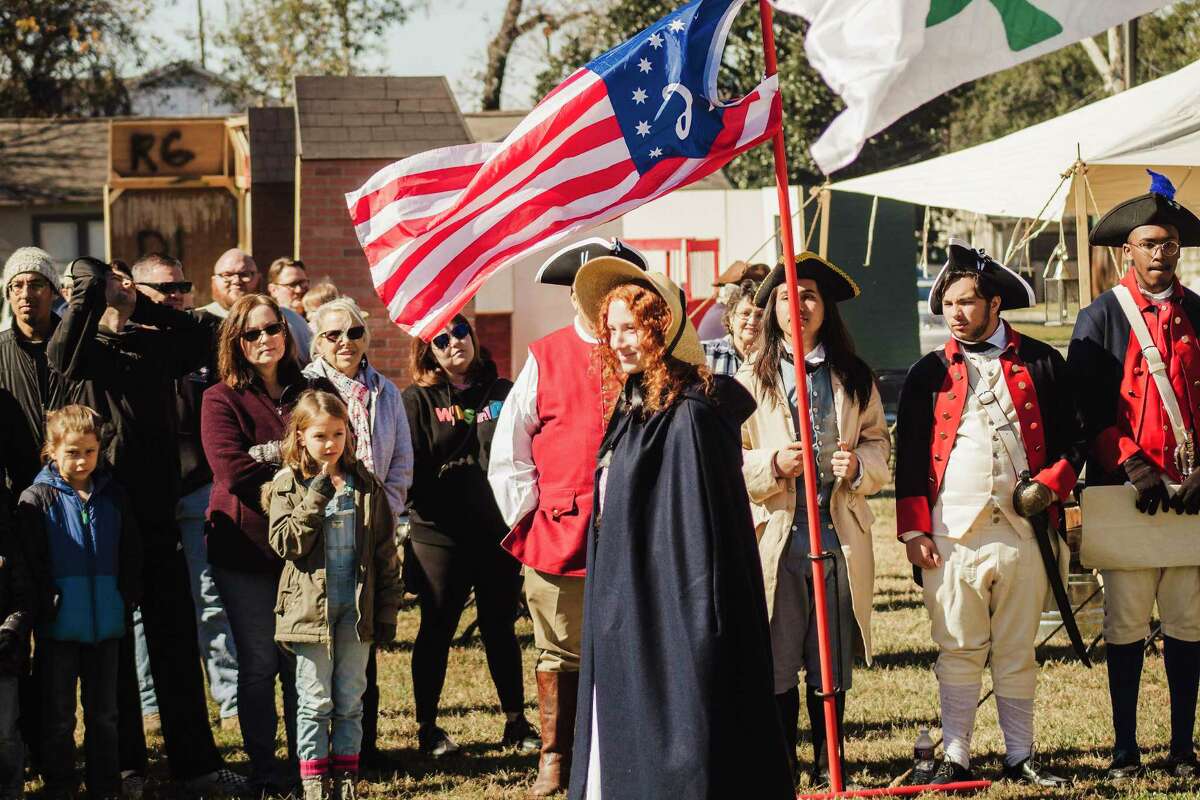 Reenactors with Revolutionary Education Inc. perform for the public at the Humble Museum last January. The organization uses performers and interactive activities to tell the story of the founding fathers.