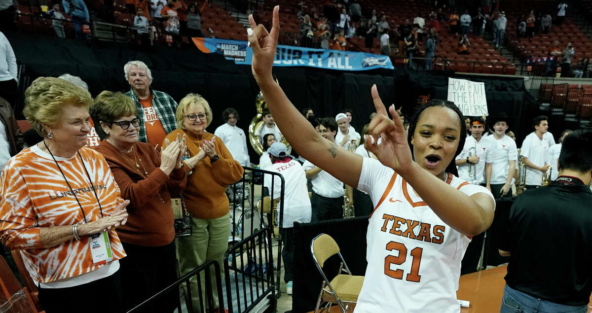 Texas forward Aaliyah Moore (21) celebrates after the team's win over Fairfield in a college basketball game in the first round of the NCAA women's tournament, Friday, March 18, 2022, in Austin, Texas. (AP Photo/Eric Gay)