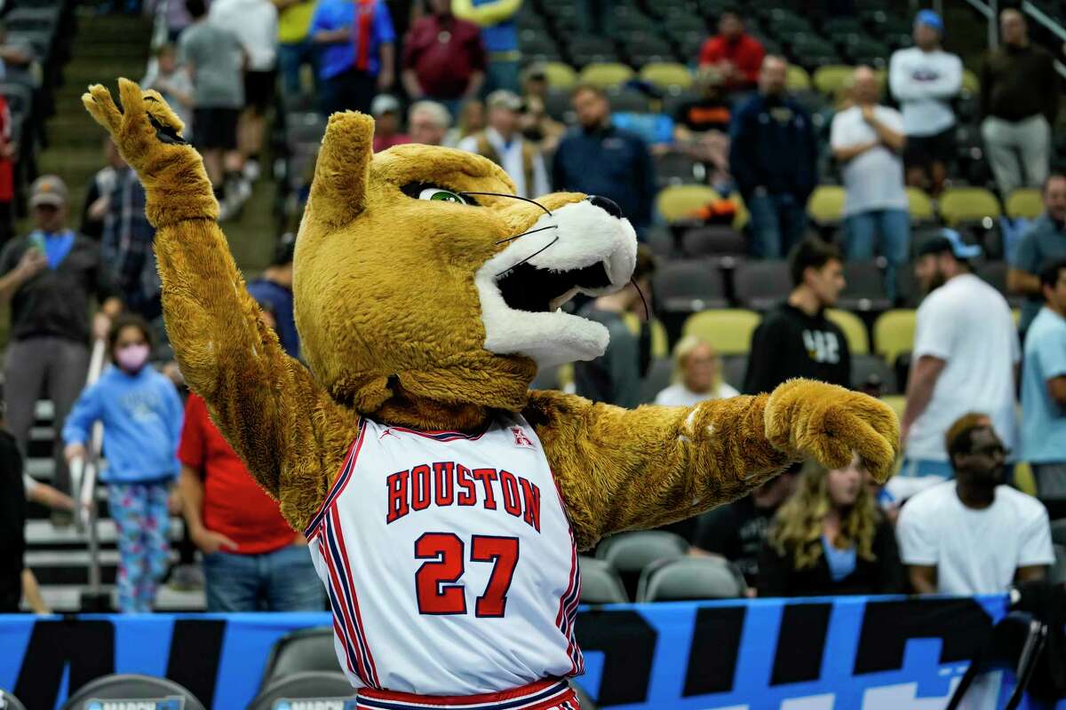 The University of Houston Cougar mascot cheers before the first half of a first-round game in the NCAA men's college basketball tournament Friday, March 18, 2022, in Pittsburgh.