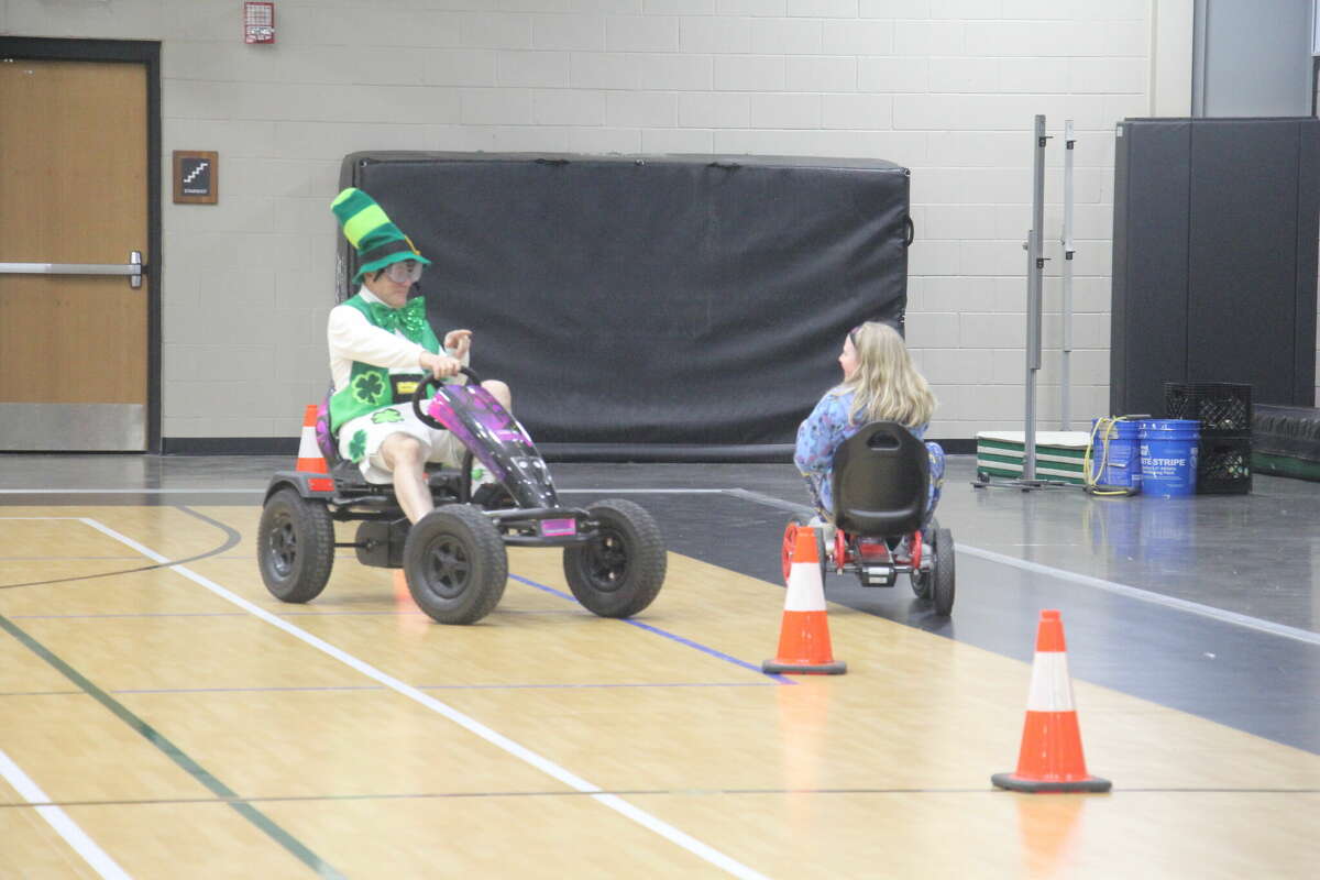 Raymond Bugg, of the Bugg's, tested out the MSP's Fatal Vision Pedal Cars with goggles on.