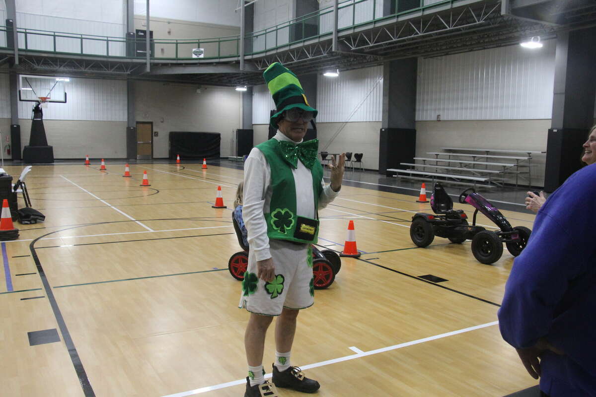 Raymond Bugg, of the Bugg's, tested out the MSP's Fatal Vision Pedal Cars with goggles on.