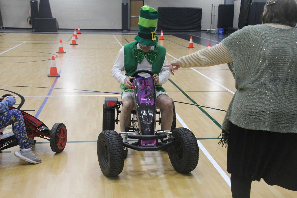 Raymond Bugg, of the Bugg's, tested out the MSP's Fatal Vision Pedal Cars with goggles on.