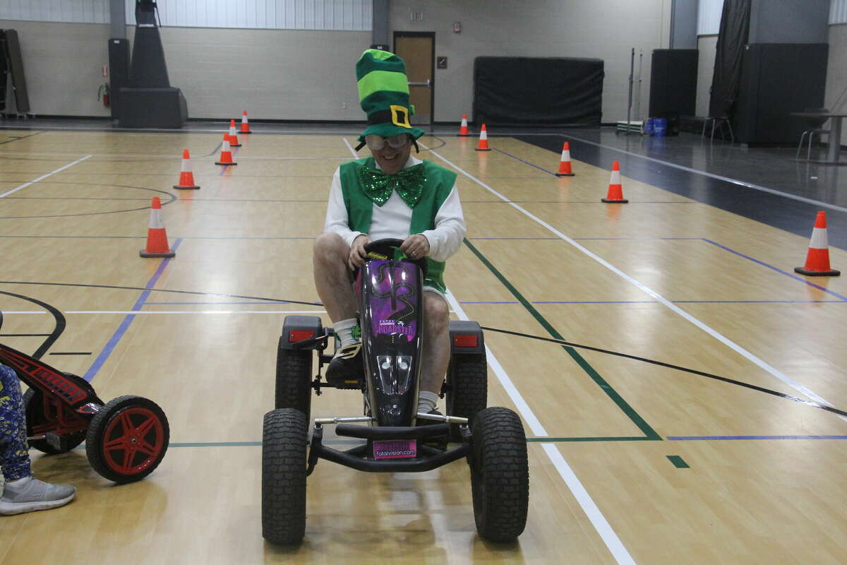 Raymond Bugg, of the Bugg's, tested out the MSP's Fatal Vision Pedal Cars with goggles on.